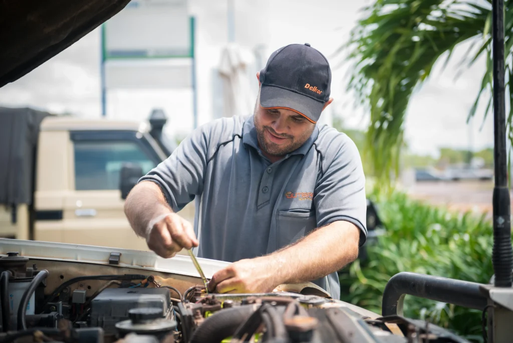 Commercial Photography Outback Battery Rep Installing battery